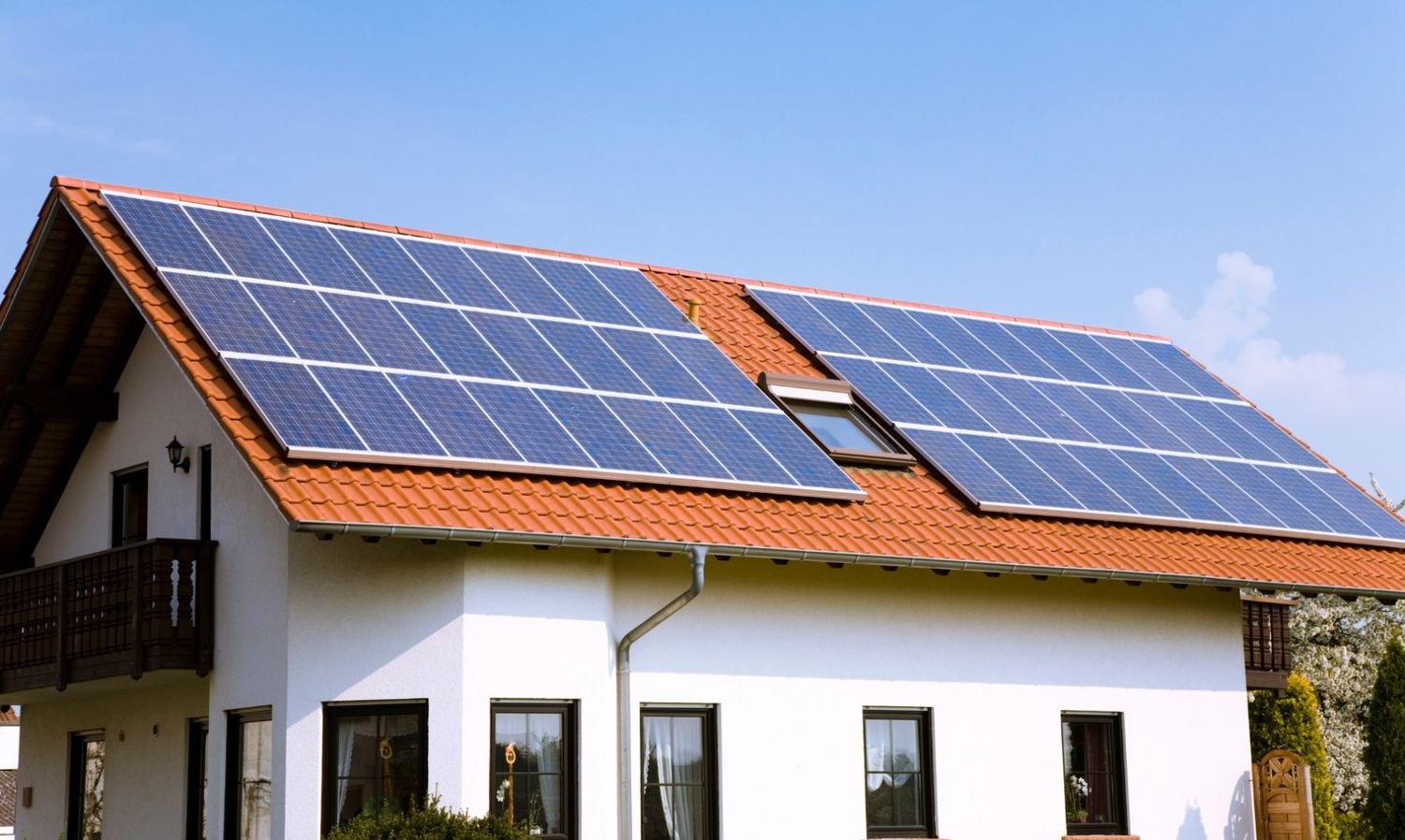 Family beside their new rooftop solar system